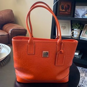 Orange Dooney & Burke logo handbag